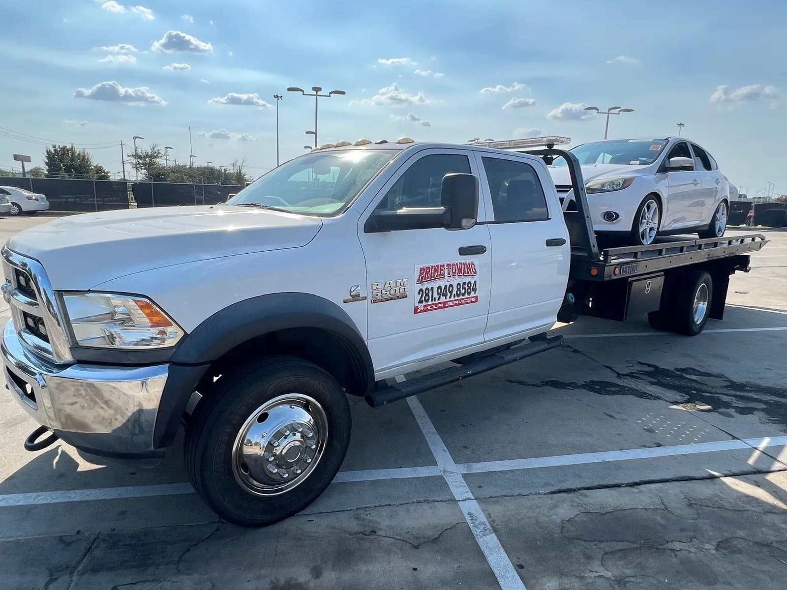 Prime Towing LLC flatbed tow truck in Houston TX
