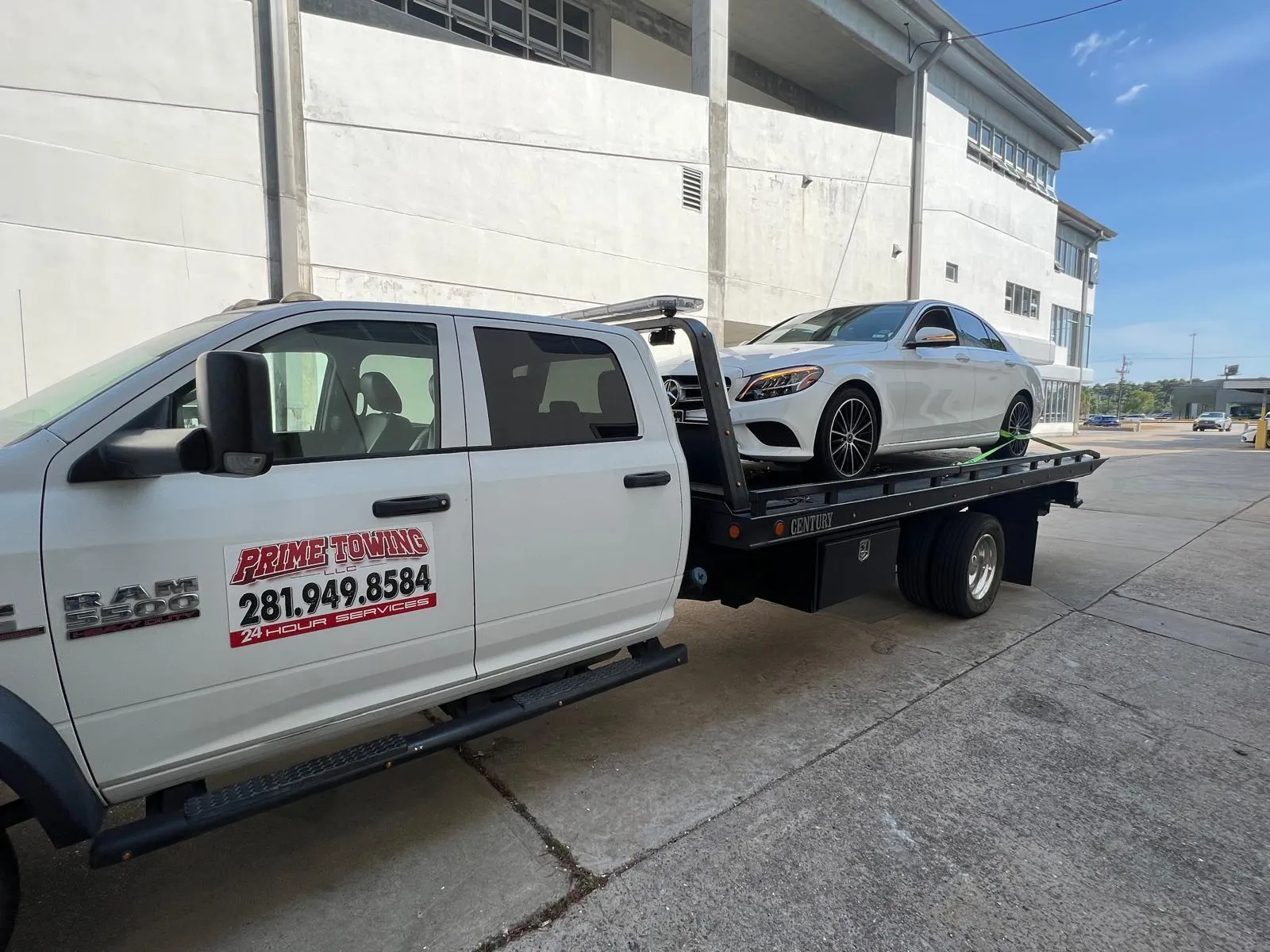 White Mercedes-Benz C-Class on Prime Towing flatbed in Houston TX